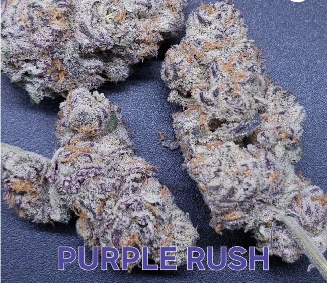 Close-up of purple cannabis buds with 'Purple Rush' text on a dark background