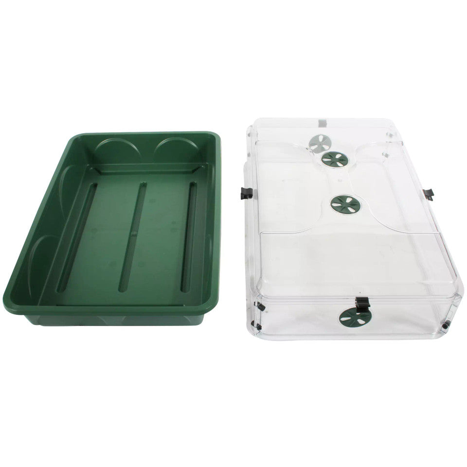 A green rectangular plastic tray shown next to a clear plastic cover with green circular vent holes and black clips, on a plain white background.